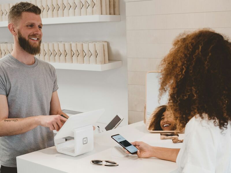 Boomerang team member speaking with a customer in a retail location